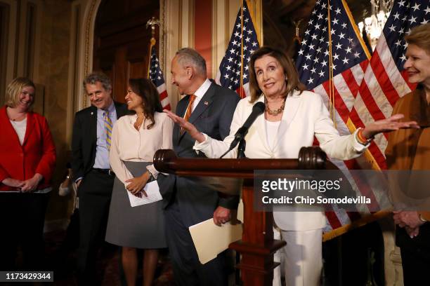Speaker of the House Nancy Pelosi gestures during a news conference with Dayton Mayor Nan Whaley, Sen. Sherrod Brown , Rep. Veronica Escobar , Senate...