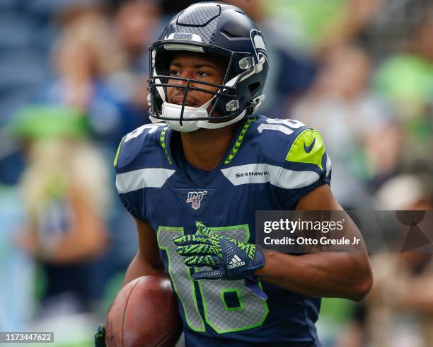 Wide receiver Tyler Lockett of the Seattle Seahawks warms up prior to the game against the Cincinnati Bengals at CenturyLink Field on September 8,...