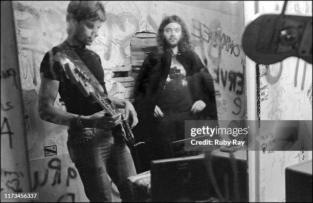 American musician Roky Erickson of psychedelic group 13th Floor Elevators and John Maxwell reflected in a mirror backstage at the Mabuhay Gardens...