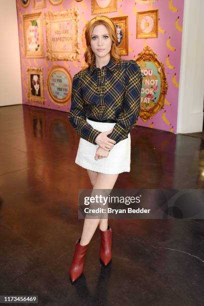 Brittany Snow visits the artist in residence: Ashley Longshore installation during New York Fashion Week: The Shows at Spring Studios on September...