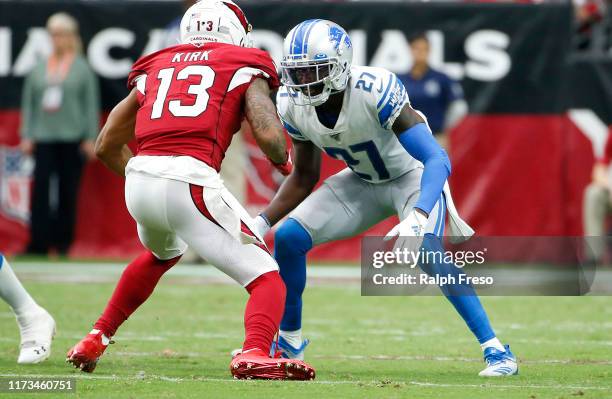 Cornerback Justin Coleman of the Detroit Lions defends wide receiver Christian Kirk of the Arizona Cardinals during the first half of the NFL...