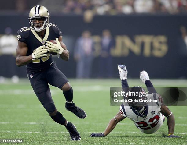 Wide receiver Michael Thomas of the New Orleans Saints moves against the defense of Aaron Colvin of the Houston Texans during the game at Mercedes...