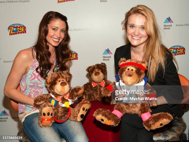 Nicole Wood Kids TV Host and Shannon Elizabeth attends Teddy Bear Day for the en-Courage Kids Foundation to hand out Teddy Bears to children at Mount...