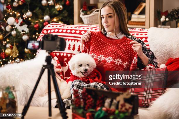 fashion blogger hosting a christmas giveaway - winter woman showing stock pictures, royalty-free photos & images