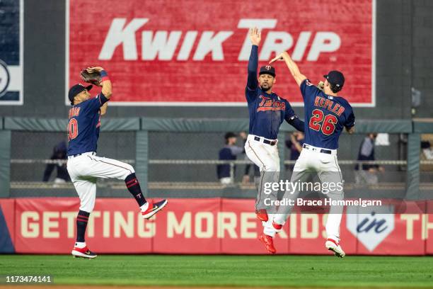 Eddie Rosario, Byron Buxton and Max Kepler celebrate against the Cleveland Indians on September 7, 2019 at the Target Field in Minneapolis,...