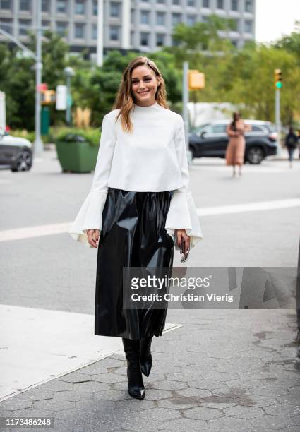 Olivia Palermo is seen wearing white top, black skirt outside Carolina Herrera during New York Fashion Week September 2019 on September 09, 2019 in...