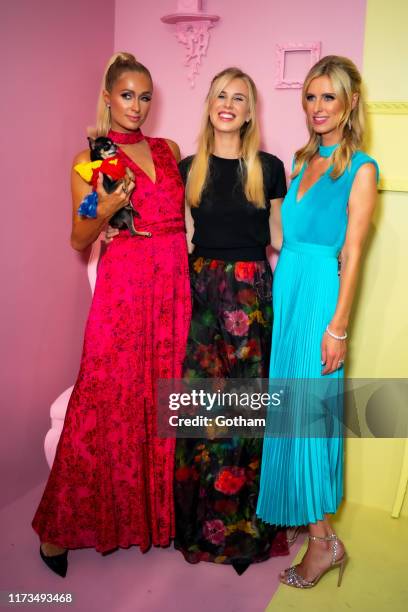 Paris Hilton, Tessa Hilton and Nicky Hilton attend the Alice + Olivia by Stacey Bendet presentation during New York Fashion Week: The Shows at Root...