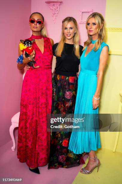 Paris Hilton, Tessa Hilton and Nicky Hilton attend the Alice + Olivia by Stacey Bendet presentation during New York Fashion Week: The Shows at Root...