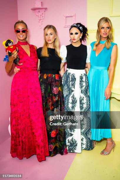 Paris Hilton, Tessa Hilton, Stacey Bendet and Nicky Hilton attend the Alice + Olivia by Stacey Bendet presentation during New York Fashion Week: The...
