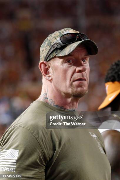 Legend The Undertaker watches from the sideline during the game between the Texas Longhorns and the LSU Tigers at Darrell K Royal-Texas Memorial...