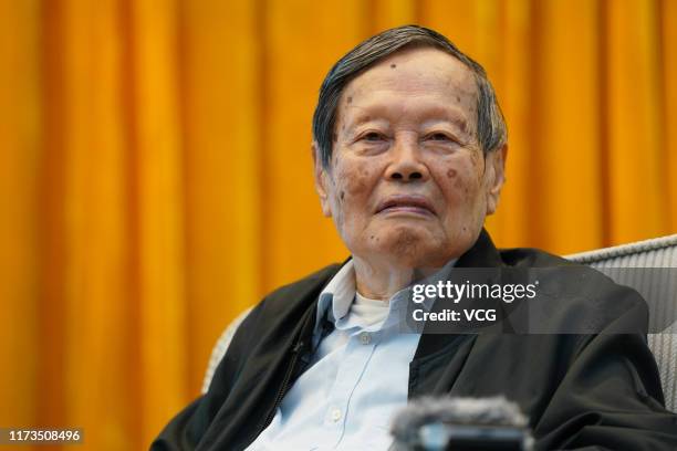 Yang Chen-Ning , Chinese-American Nobel laureate in Physics, makes a keynote report during the 1st Joint Conference by the Chinese Academy of...