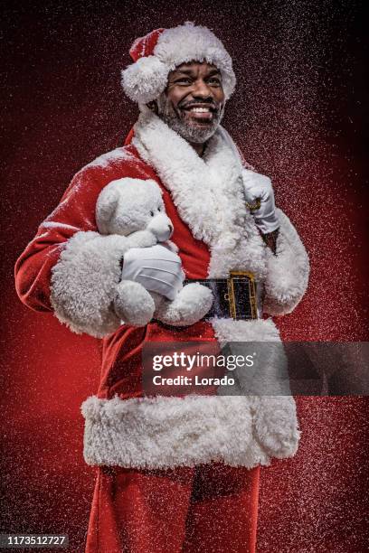 good santa claus black man - santa portrait stock pictures, royalty-free photos & images