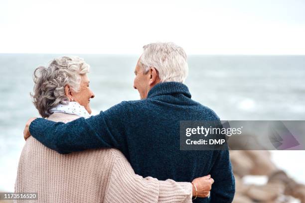 connecting with each other in nature - arm around stock pictures, royalty-free photos & images