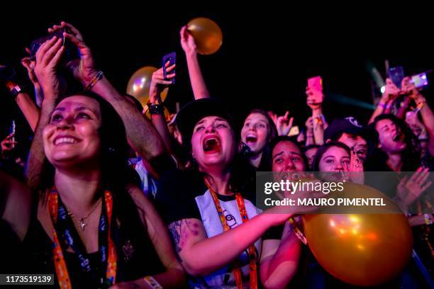 Fans enjoy the show of Panic! at the Disco during Rock in Rio festival, Olympic Park, Rio de Janeiro, Brazil, on October 03, 2019. - The week-long...