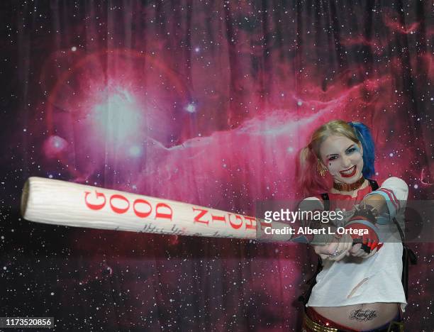 Cosplayer dressed as Harley Quinn from "Suicide Squad" attends Day 1 of the Long Beach Comic Con held at Long Beach Convention Center on August 31,...