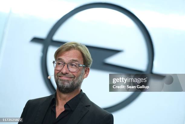 Juergen Klopp, Manager of FC Liverpool, visits the Opel stand at the 2019 IAA Frankfurt Auto Show on September 10, 2019 in Frankfurt am Main,...