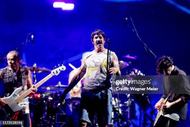 Flea, Anthony Kiedis and Josh Klinghoffer of the Red Hot Chili Peppers performs during Rock in Rio 2019 at Palco Mundo at Cidade do Rock on October...