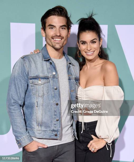 Jared Haibon and Ashley Iaconetti arrive at the Premiere Of Lionsgate's "Jexi" at Fox Bruin Theatre on October 3, 2019 in Los Angeles, California.
