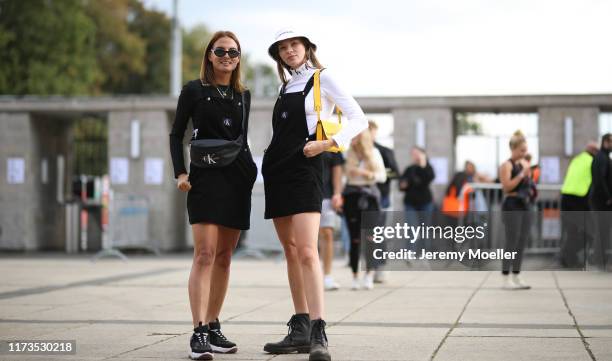 Anna Winter and Karla Kuhlm wearing a complete Calvin Klein look on September 07, 2019 in Berlin, Germany.