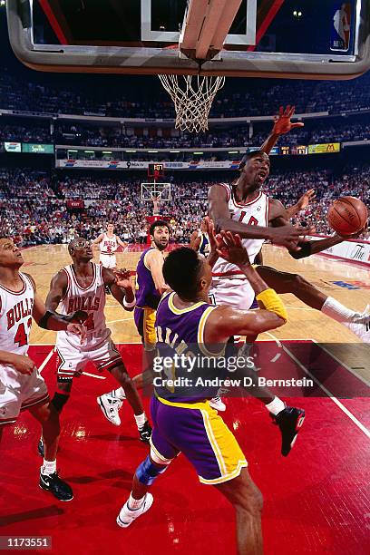 Michael Jordan of the Chicago Bulls drives to the basket against Sam Perkins of the Los Angeles Lakers during game two of the 1991 NBA Finals on June...