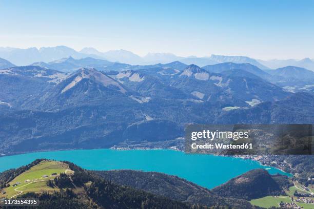 scenic view of wolfgangsee by saint gilgen and european alps against blue sky - watzmann fotografías e imágenes de stock