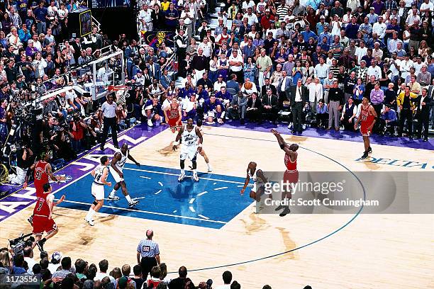 Michael Jordan of the Chicago Bulls shoots the game winner against the Utah Jazz in the 1998 NBA FINALS of Game 6. The shot gave the Bulls their...