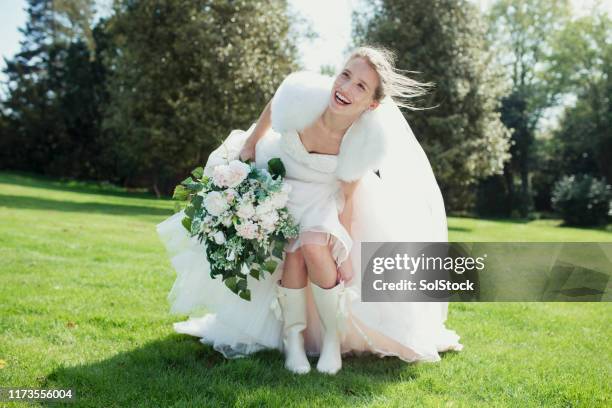 the happiest day - bride in wellies stock pictures, royalty-free photos & images
