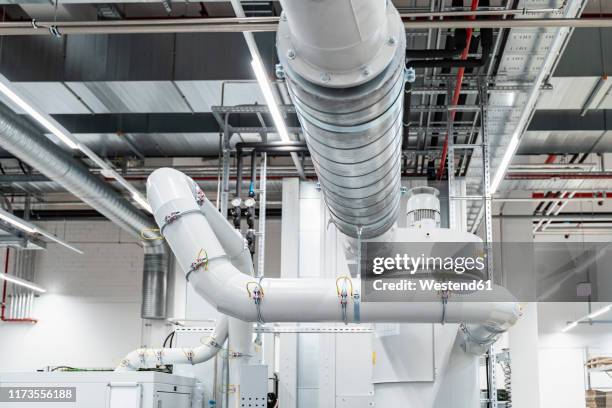 pipeline inside modern factory, stuttgart, germany - pipes and ventilation stock pictures, royalty-free photos & images