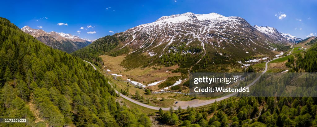 Scenic panorama of winding road across forested landscape of†Defereggen†Valley, East†Tyrol, Austria