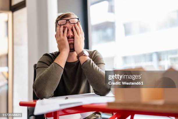 exhausted architect in office - burnout stock pictures, royalty-free photos & images