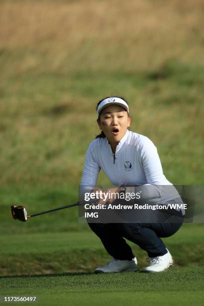 Lucy Li of Team USA reacts after a missed putt during the PING Junior Solheim Cup during practice day 2 for The Solheim Cup at Gleneagles on...