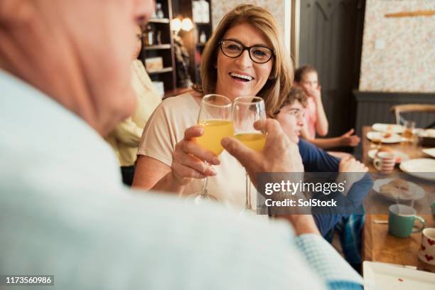 starting the day off right - mimosa drink stock pictures, royalty-free photos & images