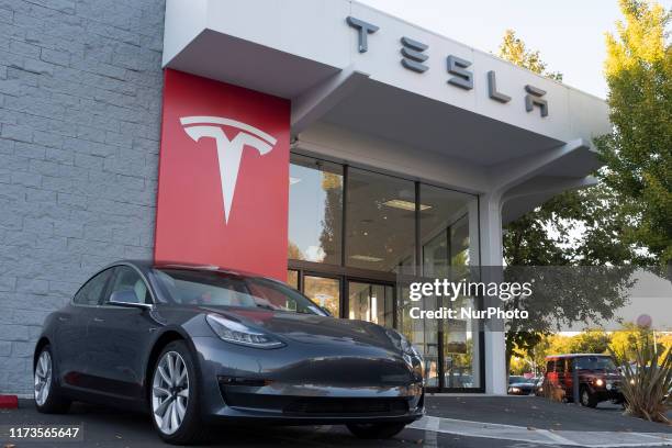 Tesla vehicles are on display at a Tesla store in Palo Alto, California, United States on October 3, 2019. Telsa Inc. Shares fell more than 4 percent...