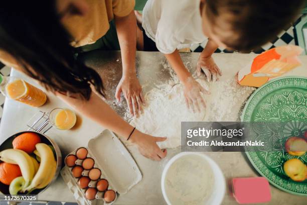 baking with my mom - mother's day breakfast stock pictures, royalty-free photos & images