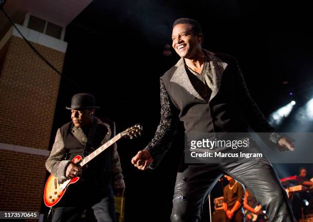 Tito Jackson and Jackie Jackson of the Jacksons perform on stage at Wolf Creek Amphitheater on September 07, 2019 in Atlanta, Georgia.