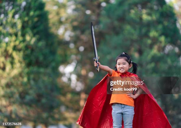 wonder girl - superhero girl stock pictures, royalty-free photos & images