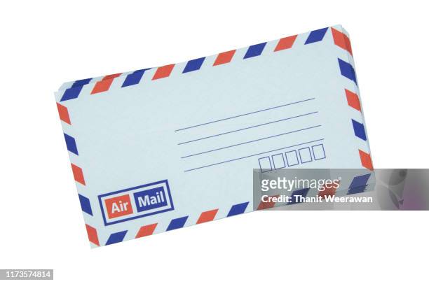 airmail envelope on white background - postmark stock-fotos und bilder