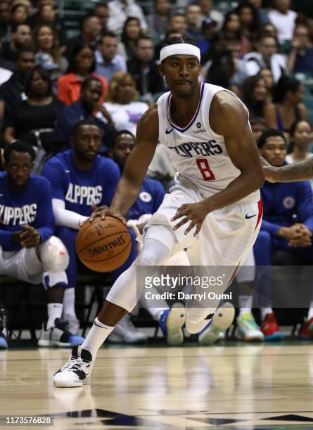 Maurice Harkless of the Los Angeles Clippers drives the baseline during the third quarter of the game against the Houston Rockets at the Stan Sheriff...