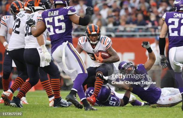 Chicago Bears running back David Montgomery carries the ball in the third quarter of a 16-6 win against the Minnesota Vikings at Soldier Field in...