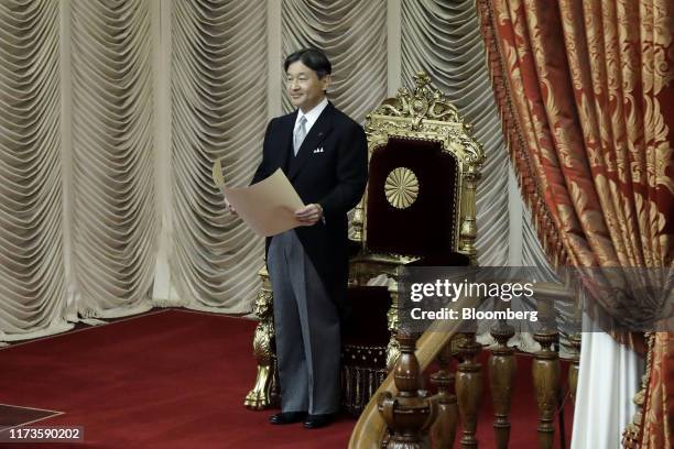 Japan's Emperor Naruhito attends the opening of an extraordinary session at the upper house of the parliament in Tokyo, Japan, on Friday, Oct. 4,...