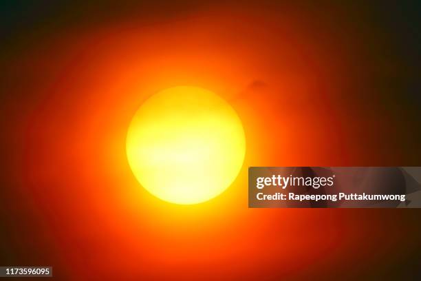 heatwave hot sun. global warming from the sun and burning. climate change. - ozone layer stock-fotos und bilder