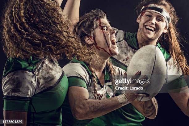 three dirty female rugby players - rugby league stock pictures, royalty-free photos & images