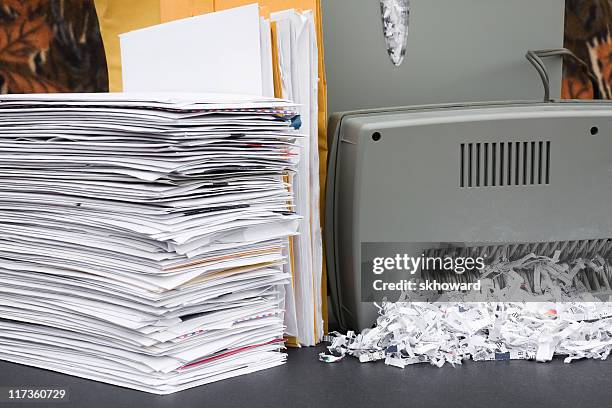 shredding - paper shredder stock pictures, royalty-free photos & images