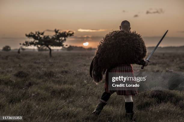 warrior wearing a kilt - kilt stock pictures, royalty-free photos & images