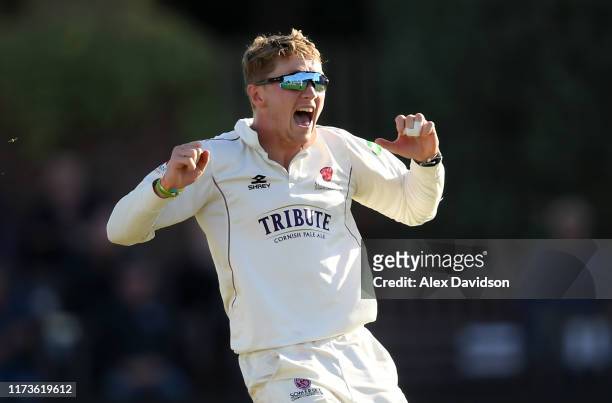 Dom Bess of Somerset celebrates the wicket of Gary Ballance of Yorkshire during Day 1 of the Specsavers County Championship match between Somerset...