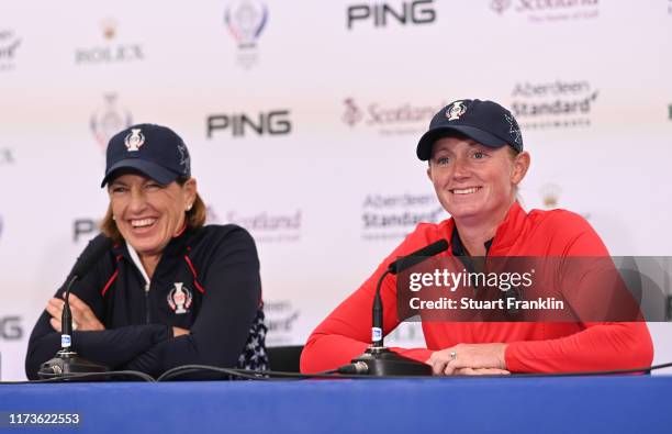 Juli Inkster, Captain of Team USA looks on with Stacy Lewis during a press conference prior to the start of The Solheim Cup at Gleneagles on...