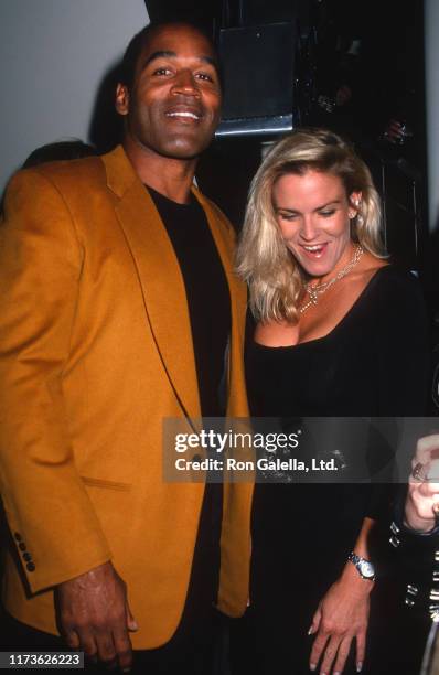 Married American couple OJ Simpson and Nicole Brown Simpson attend the grand opening of the Harley-Davidson Cafe, New York, New York, September 26,...