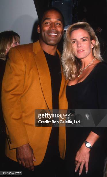 Married American couple OJ Simpson and Nicole Brown Simpson attend the grand opening of the Harley-Davidson Cafe, New York, New York, September 26,...