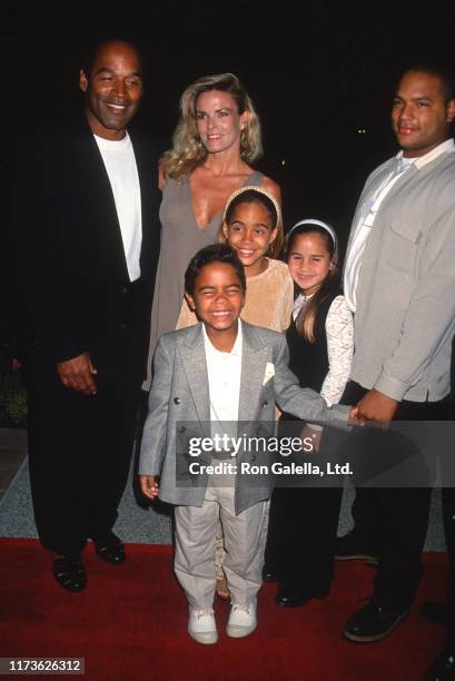 Married American couple OJ Simpson and Nicole Brown Simpson , along with their children Justin Sydney, and Jason, attend a screening of 'Naked Gun 33...