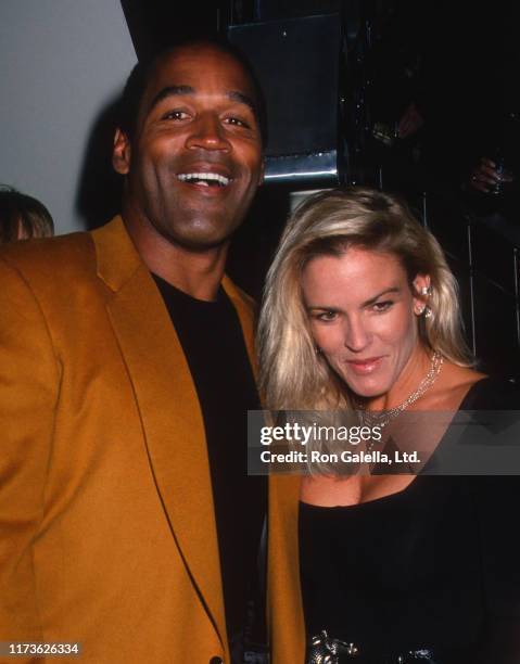 Married American couple OJ Simpson and Nicole Brown Simpson attend the grand opening of the Harley-Davidson Cafe, New York, New York, September 26,...